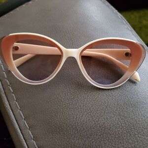 Small adult or child Beige sun glasses. New and never worn